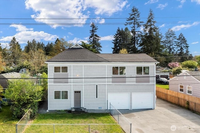 view of front of house featuring concrete driveway, fence, a front yard, entry steps, and a garage