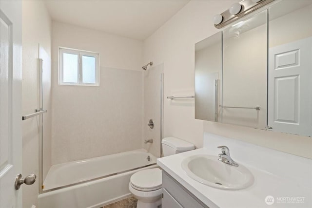 bathroom featuring vanity, shower / tub combination, and toilet