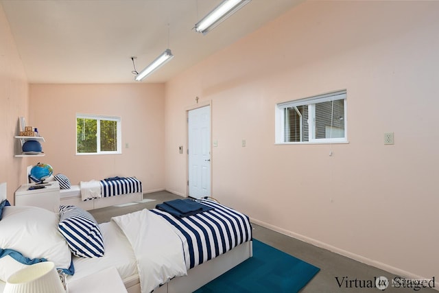 bedroom featuring baseboards