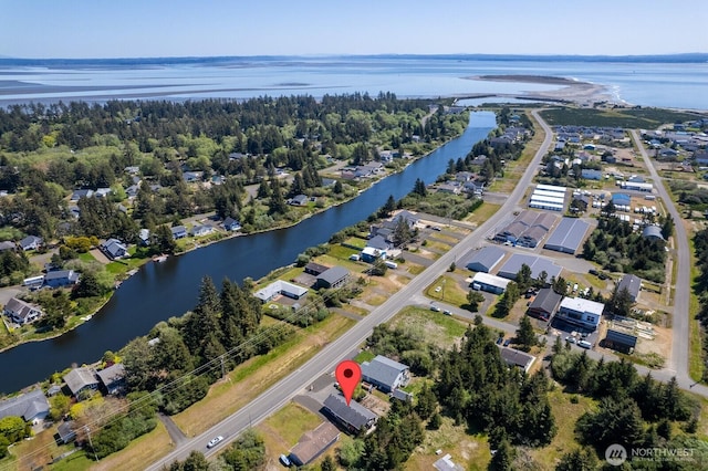 drone / aerial view with a water view