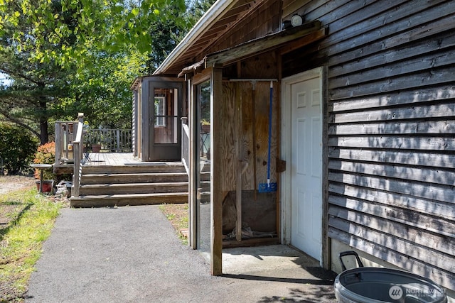 doorway to property with a deck