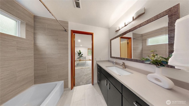 3800 NE 97th St, Seattle, WA 98115 - bathroom with shower / bathing tub combination, visible vents, vanity, and tile patterned flooring