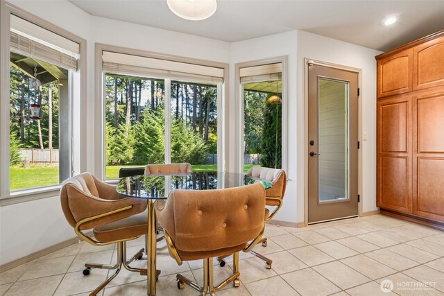 sunroom / solarium with a wealth of natural light