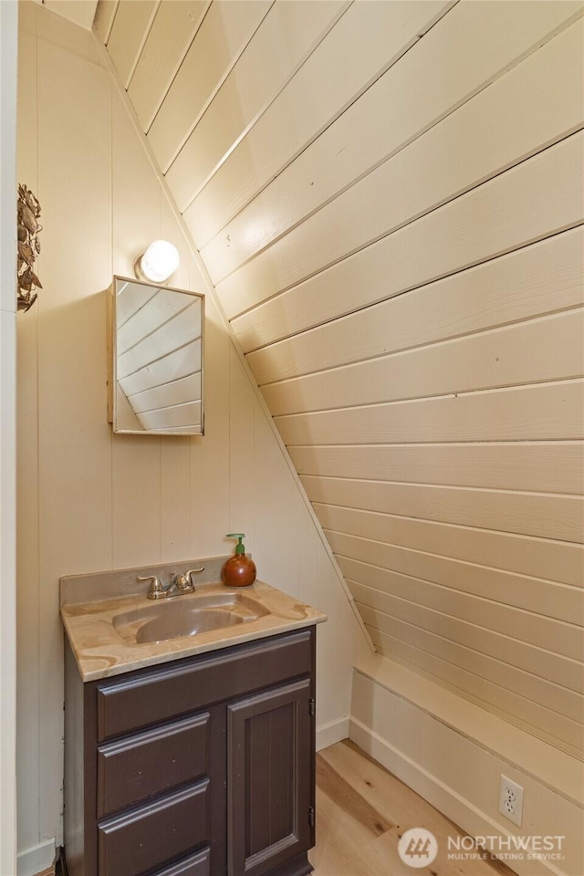 435 Lotloh St SE, Ocean Shores, WA 98569 - bathroom with lofted ceiling, wood finished floors, vanity, and wood ceiling