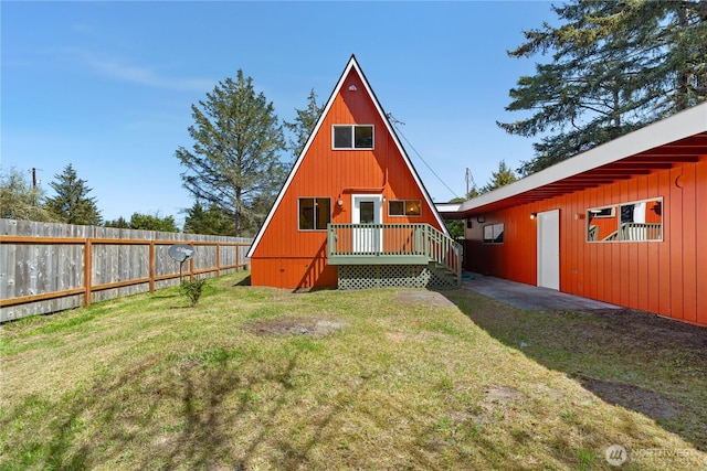 435 Lotloh St SE, Ocean Shores, WA 98569 - back of property featuring fence and a yard