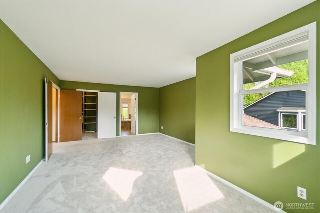13233 W 44th Ave W, Mukilteo, WA 98275 - carpeted empty room with baseboards