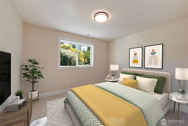bedroom with carpet floors and baseboards