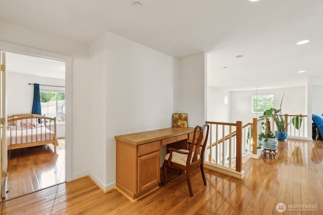 office area featuring light wood-style floors, recessed lighting, and baseboards