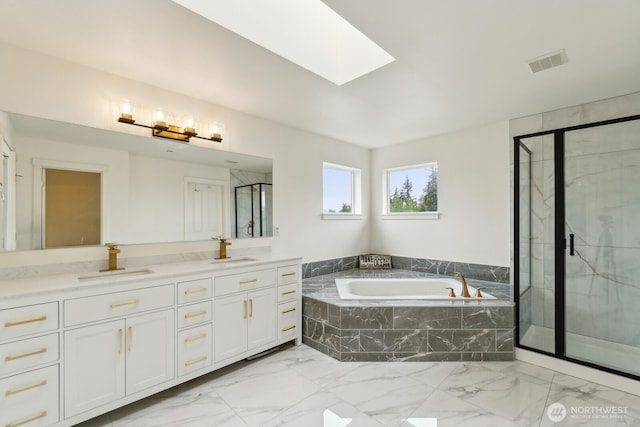 full bathroom with double vanity, a bath, visible vents, a sink, and a marble finish shower