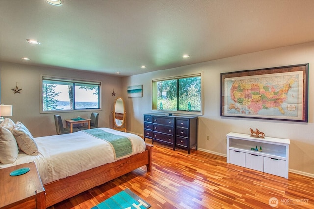519 Highlands Dr, Orcas Island, WA 98245 - bedroom with recessed lighting, wood finished floors, and baseboards