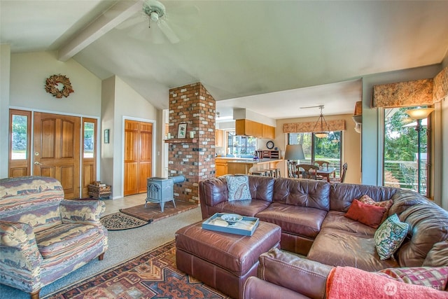 519 Highlands Dr, Orcas Island, WA 98245 - carpeted living room with a wood stove and ceiling fan