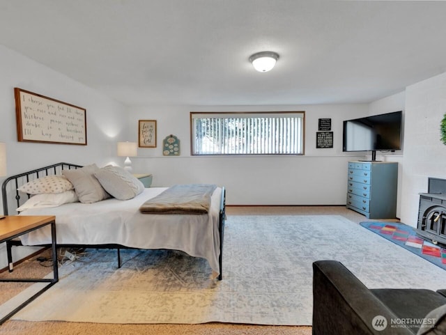 bedroom with a wood stove