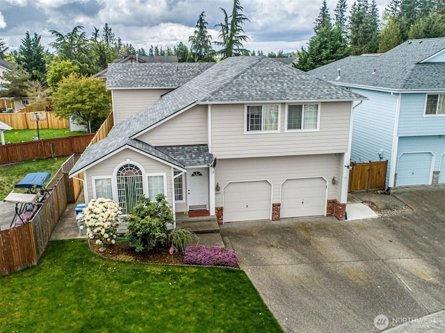 14231 SE 282nd St, Kent, WA 98042 - view of front facade with an attached garage, a front lawn, driveway, and roof with shingles