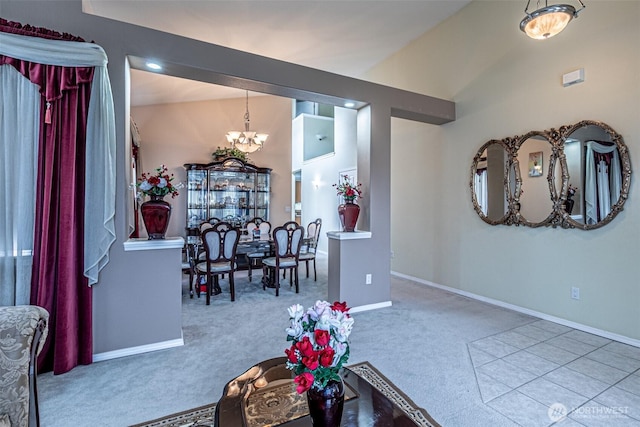 14231 SE 282nd St, Kent, WA 98042 - carpeted dining space featuring a chandelier, vaulted ceiling, and baseboards