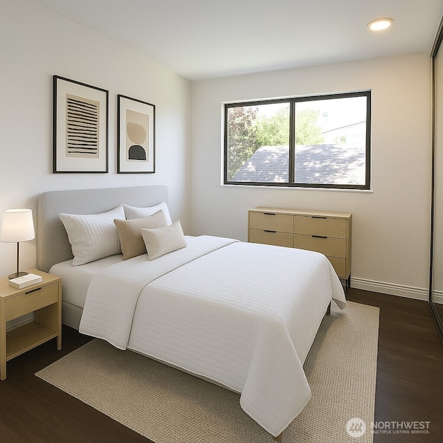 bedroom with dark wood-style floors, recessed lighting, and baseboards