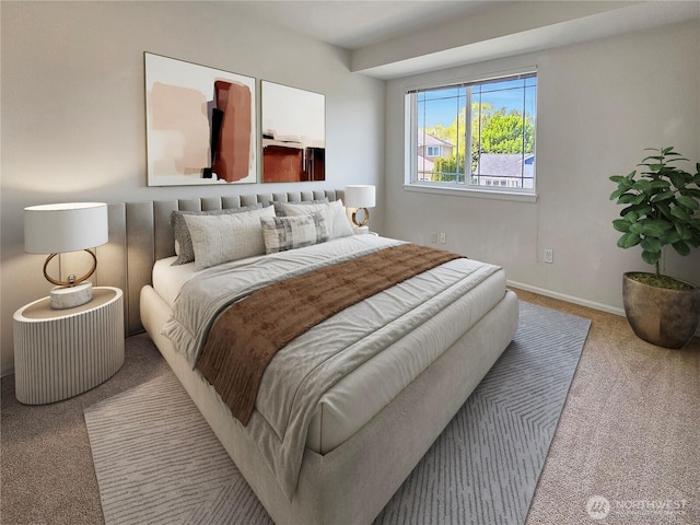 bedroom featuring baseboards and carpet flooring