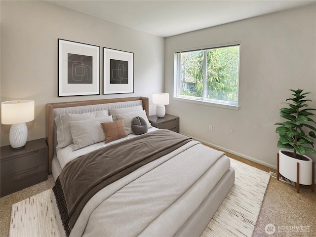carpeted bedroom with baseboards