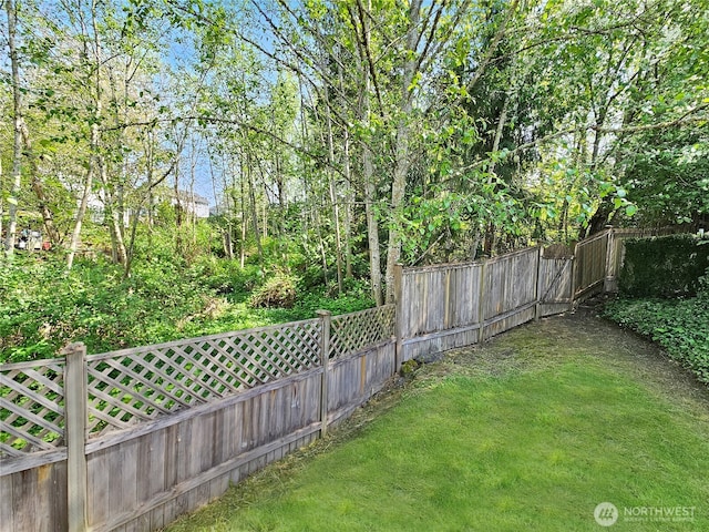 view of yard featuring fence