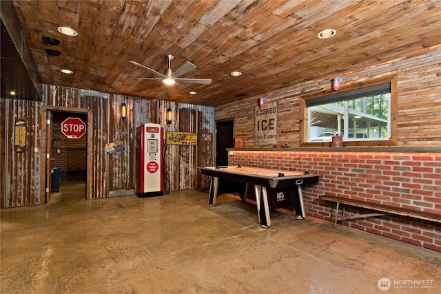 25012 67th Ave E, Graham, WA 98338 - game room featuring concrete floors, wooden walls, wooden ceiling, and ceiling fan