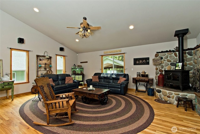 25012 67th Ave E, Graham, WA 98338 - living area with vaulted ceiling, light wood-style floors, ceiling fan, and a healthy amount of sunlight