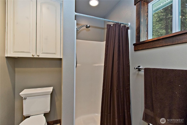 25012 67th Ave E, Graham, WA 98338 - bathroom featuring a shower stall and toilet