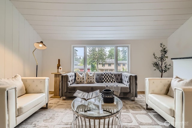living room featuring vaulted ceiling