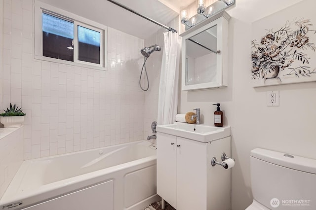 full bath featuring vanity, toilet, and shower / tub combo