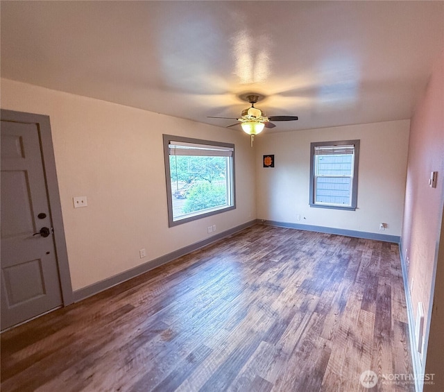 914 Puget St NE, Olympia, WA 98506 - spare room with a ceiling fan, baseboards, plenty of natural light, and wood finished floors