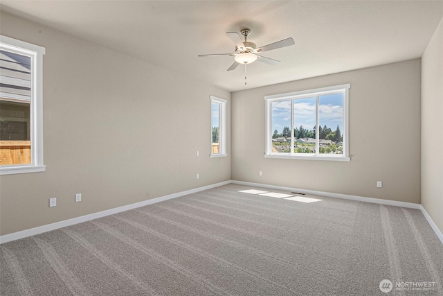 9621 7th Ave SE, Lacey, WA 98513 - carpeted empty room featuring a ceiling fan and baseboards