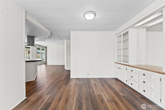 interior space featuring dark wood-type flooring