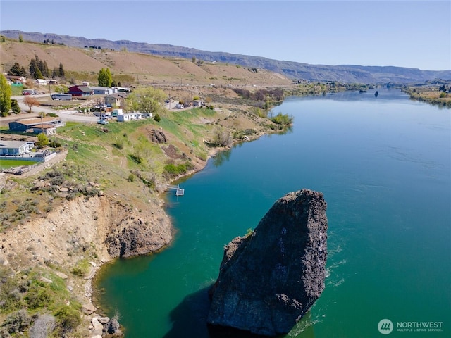 aerial view with a water and mountain view