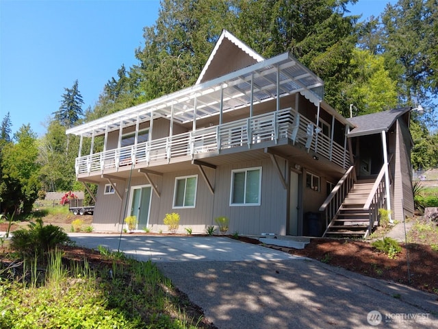 back of property with stairway