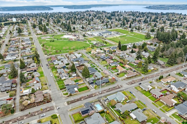 bird's eye view with a residential view and a water view