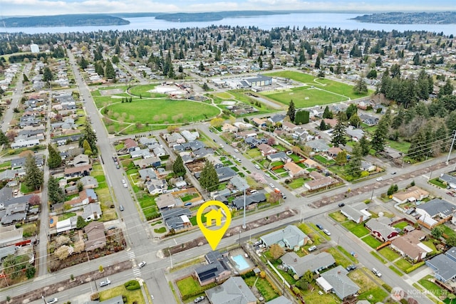 bird's eye view featuring a residential view and a water view