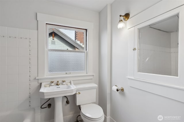bathroom featuring toilet