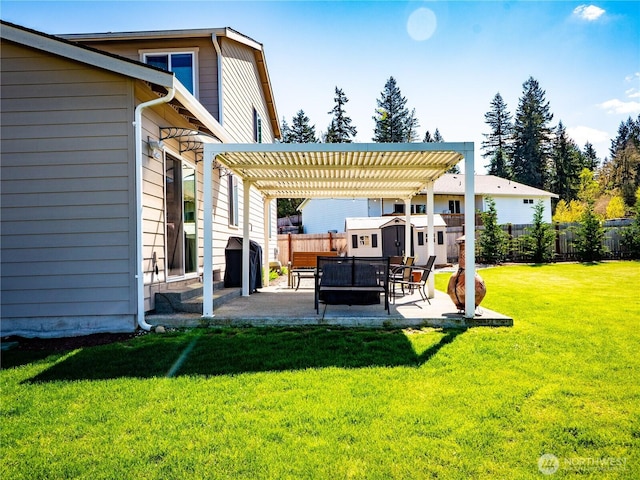 806 Cody St SE, Rainier, WA 98576 - view of yard featuring a pergola, a patio, and an outbuilding