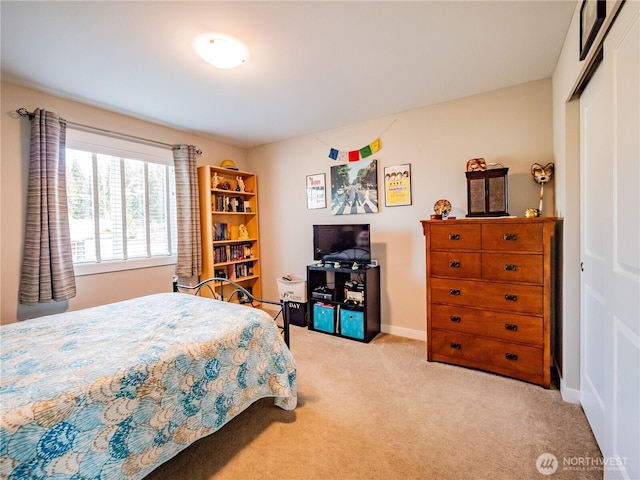 806 Cody St SE, Rainier, WA 98576 - carpeted bedroom featuring a closet and baseboards