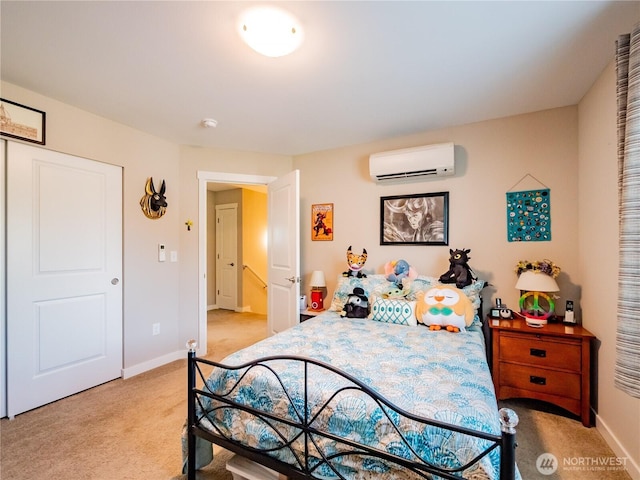 806 Cody St SE, Rainier, WA 98576 - bedroom featuring a wall mounted air conditioner, light carpet, and baseboards