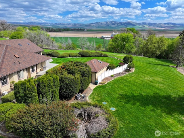 bird's eye view featuring a rural view and a mountain view