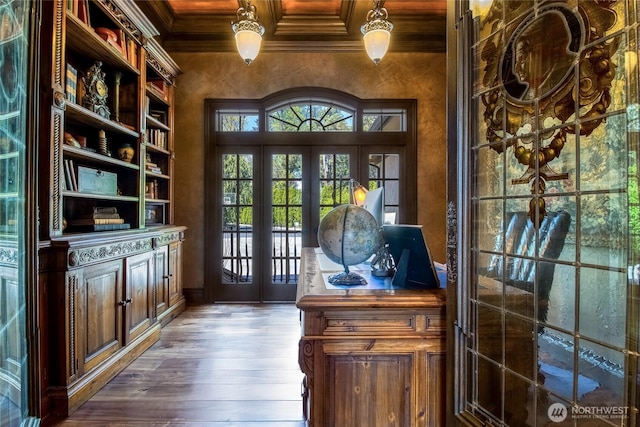 entryway with hardwood / wood-style floors, wooden ceiling, ornamental molding, and french doors