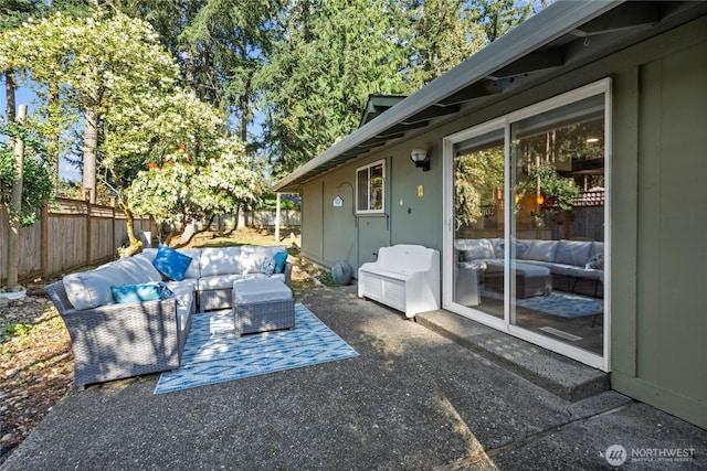 view of patio / terrace featuring an outdoor living space and a fenced backyard
