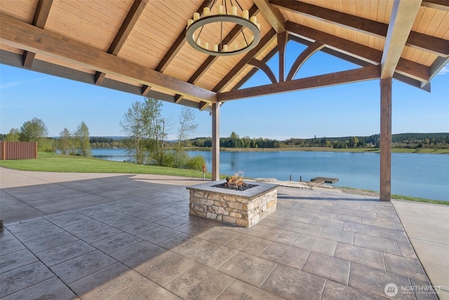 6401 Skookumchuck Rd SE, Tenino, WA 98589 - view of patio / terrace with an outdoor fire pit and a water view