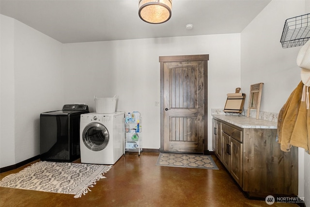 6401 Skookumchuck Rd SE, Tenino, WA 98589 - laundry room with baseboards and washer and clothes dryer