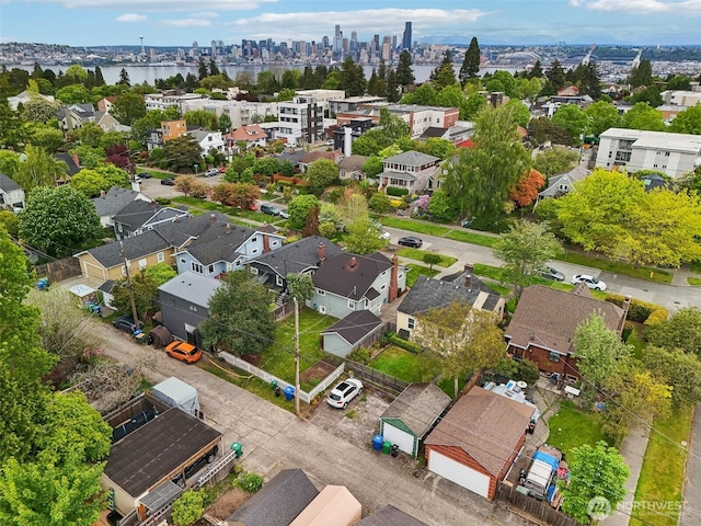 aerial perspective of suburban area featuring a large body of water