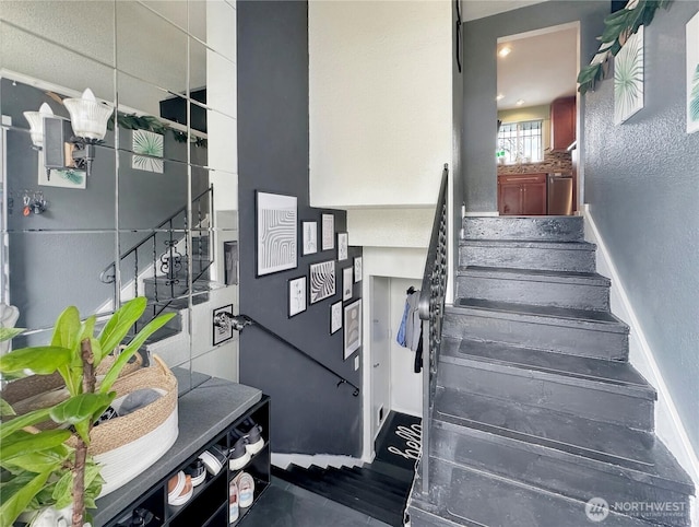 14914 20th Ave E, Parkland, WA 98445 - staircase featuring baseboards