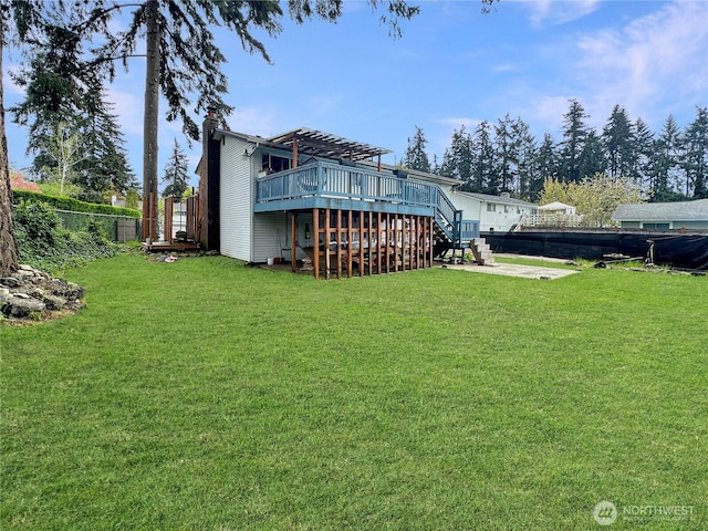 14914 20th Ave E, Parkland, WA 98445 - back of property with fence, a chimney, a deck, a yard, and stairs