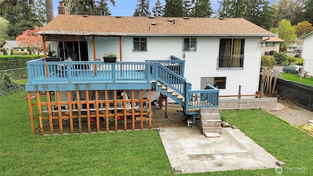 14914 20th Ave E, Parkland, WA 98445 - rear view of house with a patio area, stairs, a yard, a wooden deck, and a chimney
