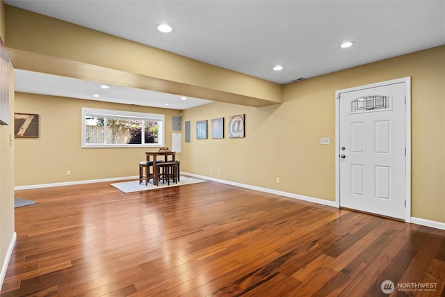entrance foyer with recessed lighting, hardwood / wood-style floors, and baseboards