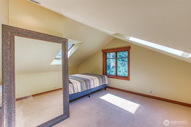 72 Thunderbird Trl, Orcas Island, WA 98280 - bedroom with a skylight, carpet floors, lofted ceiling, and baseboards