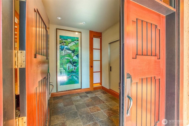 72 Thunderbird Trl, Orcas Island, WA 98280 - doorway featuring stone finish flooring and baseboards